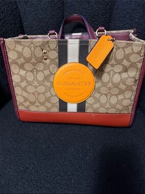 Coach Brown Signature Canvas Tote with Orange and Red Accents